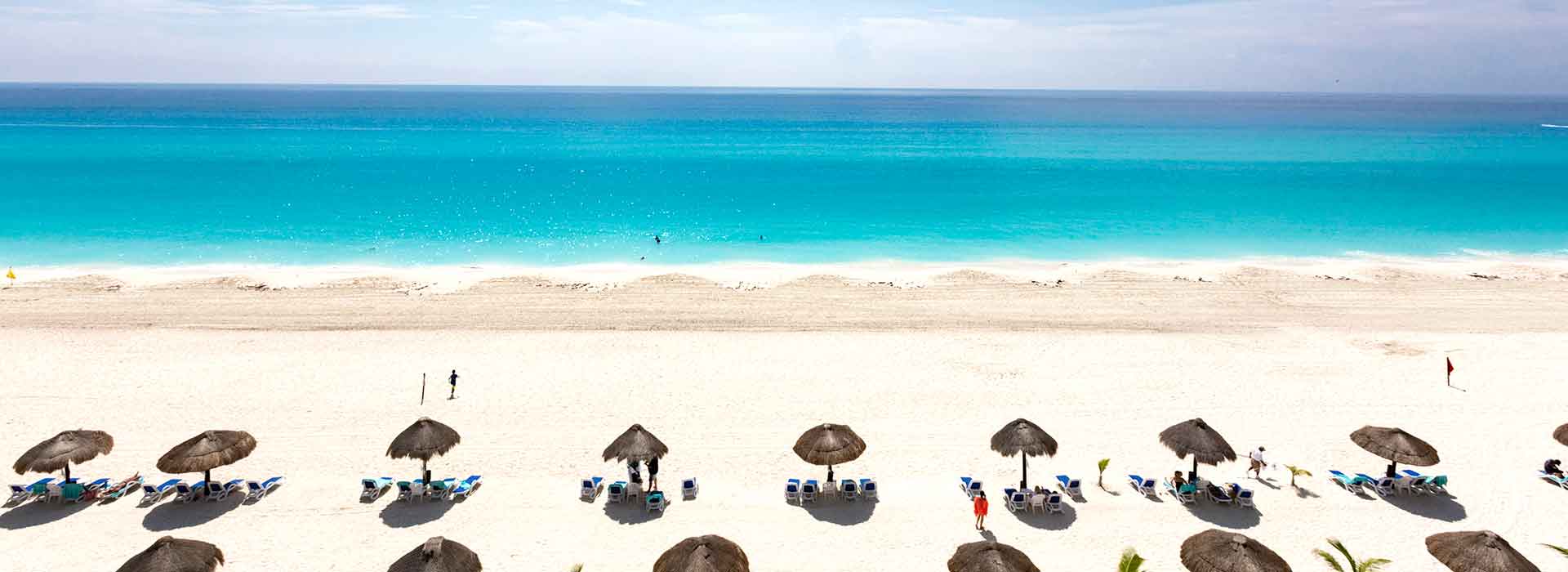 Beachfront Junior suite with private balcony to the dazzling Caribbean beach landscapes