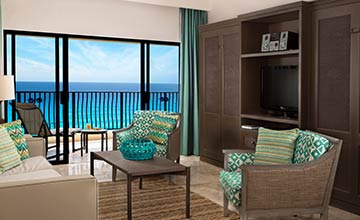 All inclusive beachfront and oceanview family suites in Cancun with ample dining and living areas
